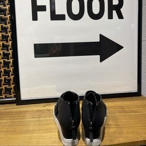 Cute black closed toed but open side shoe